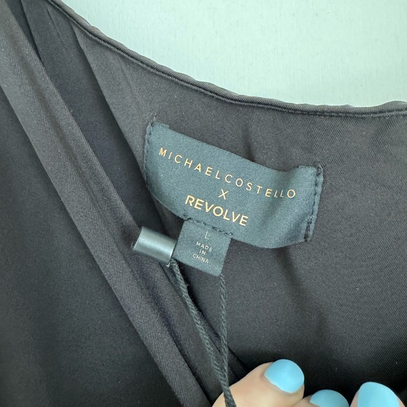 NWT REVOLVE Gilly Maxi Dress in Black
Michael Costello. Size Large - Picture 4 of 4